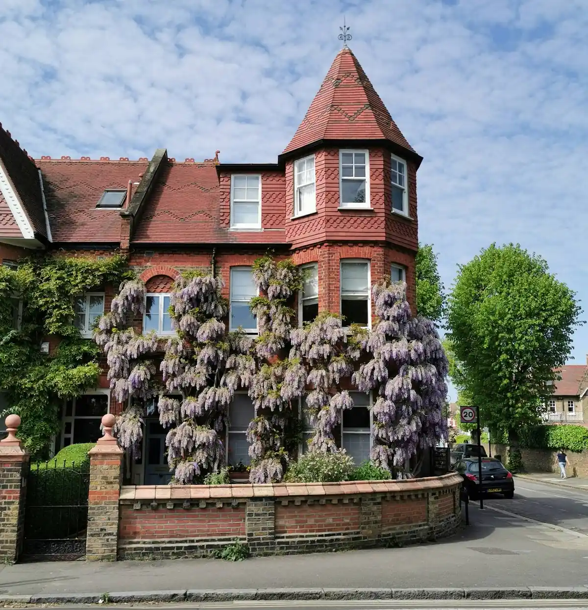 A period villa frontage under wisteria