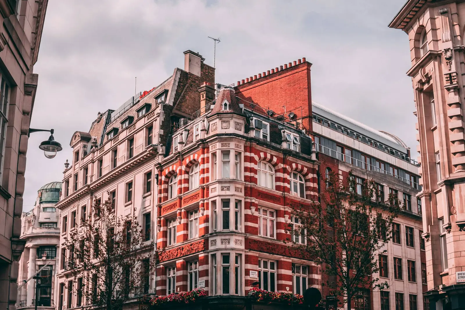 A Queen Anne revival frontage in red brick