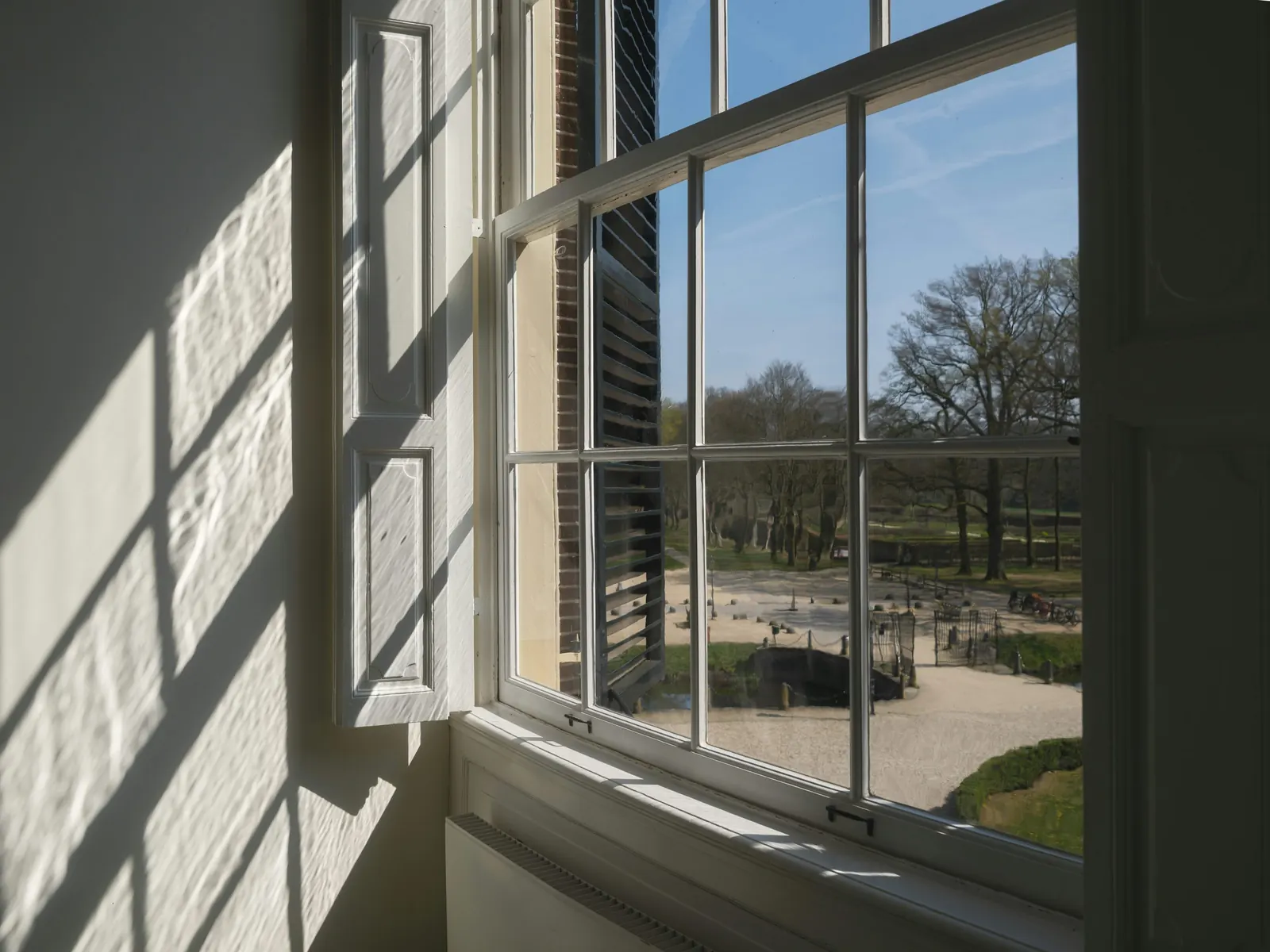Raking daylight across a multi-pane window